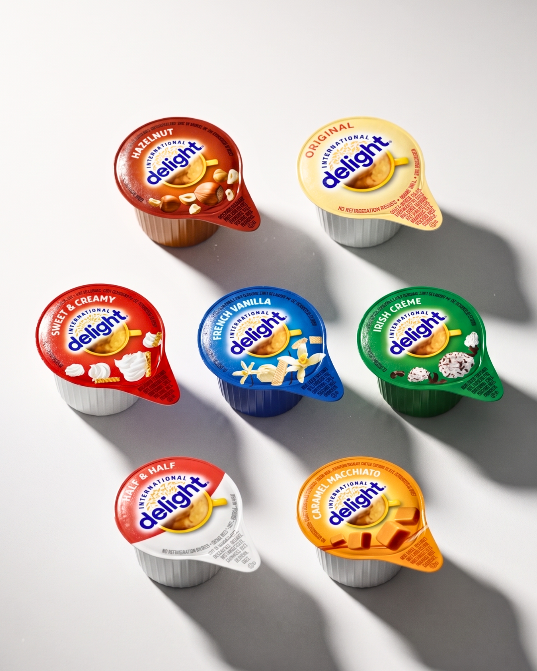 International Delight Coffee Creamer Singles 7-Flavor Variety Pack with Sweet Cream, Irish Crème & More - TRIONI Treats