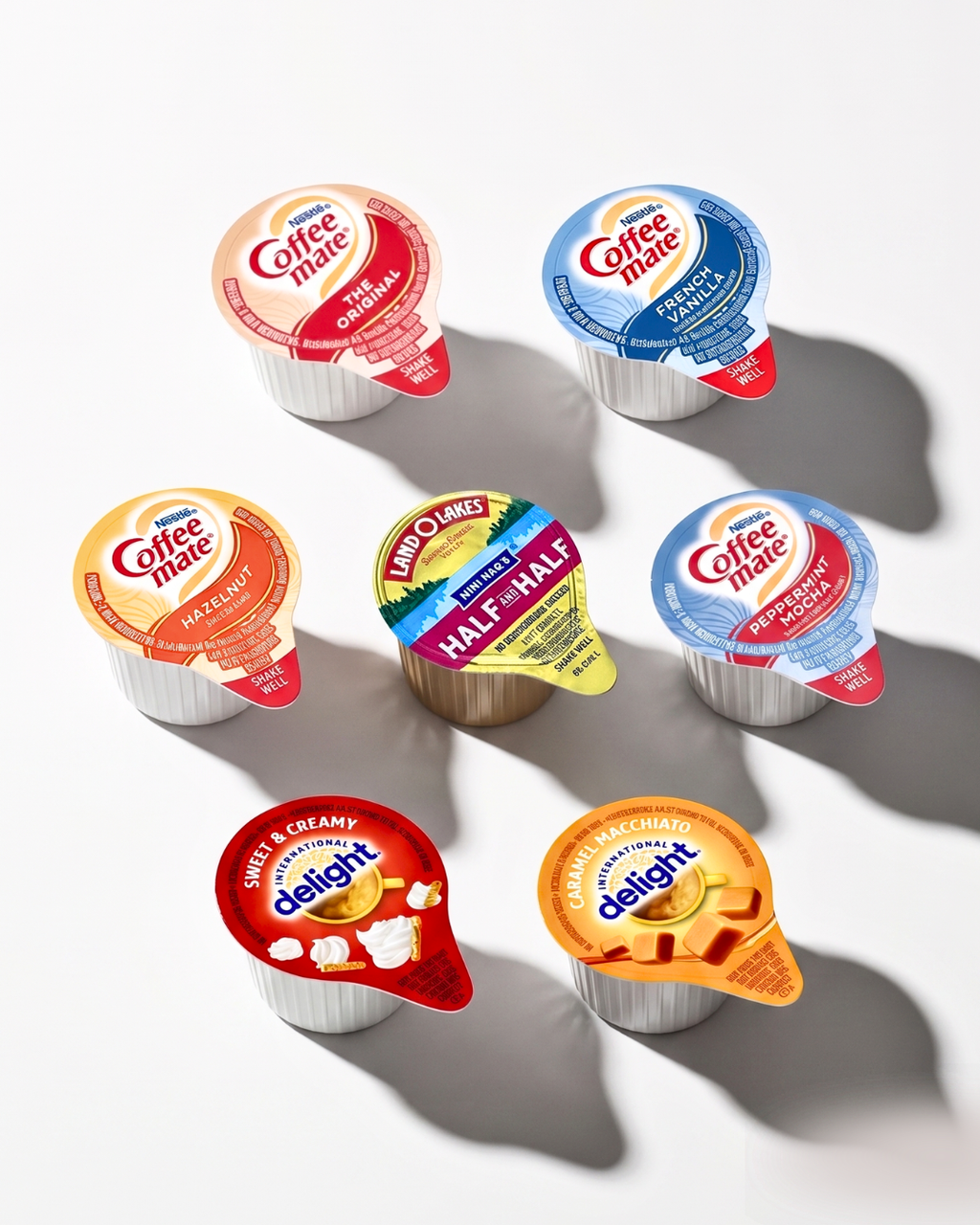 Coffee Mate Creamer Singles 7-Flavor Variety Pack with Peppermint Mocha, Sweet Cream & More - TRIONI Treats